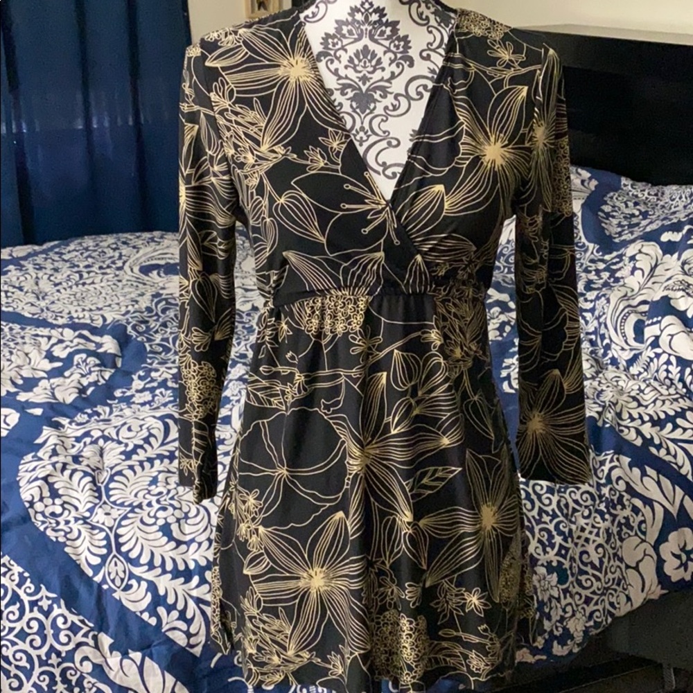 Gently worn wrap top long sleeve blouse